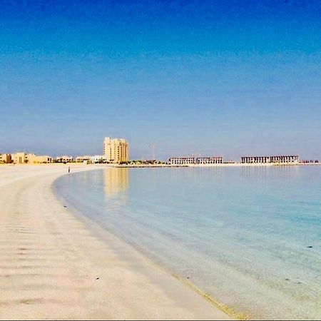 Rixos Beach Apartment Ras al-Khaimah Bagian luar foto